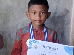 Semangat Tak Terbendung, Niko Putra Tembus Hujan Deras Demi Lomba Islami KKN-T